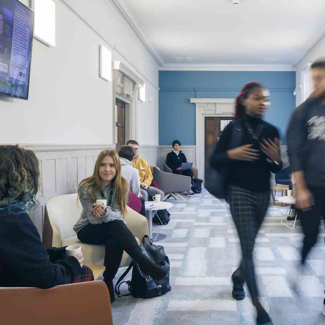 Students in the Executive Education Suite corridor