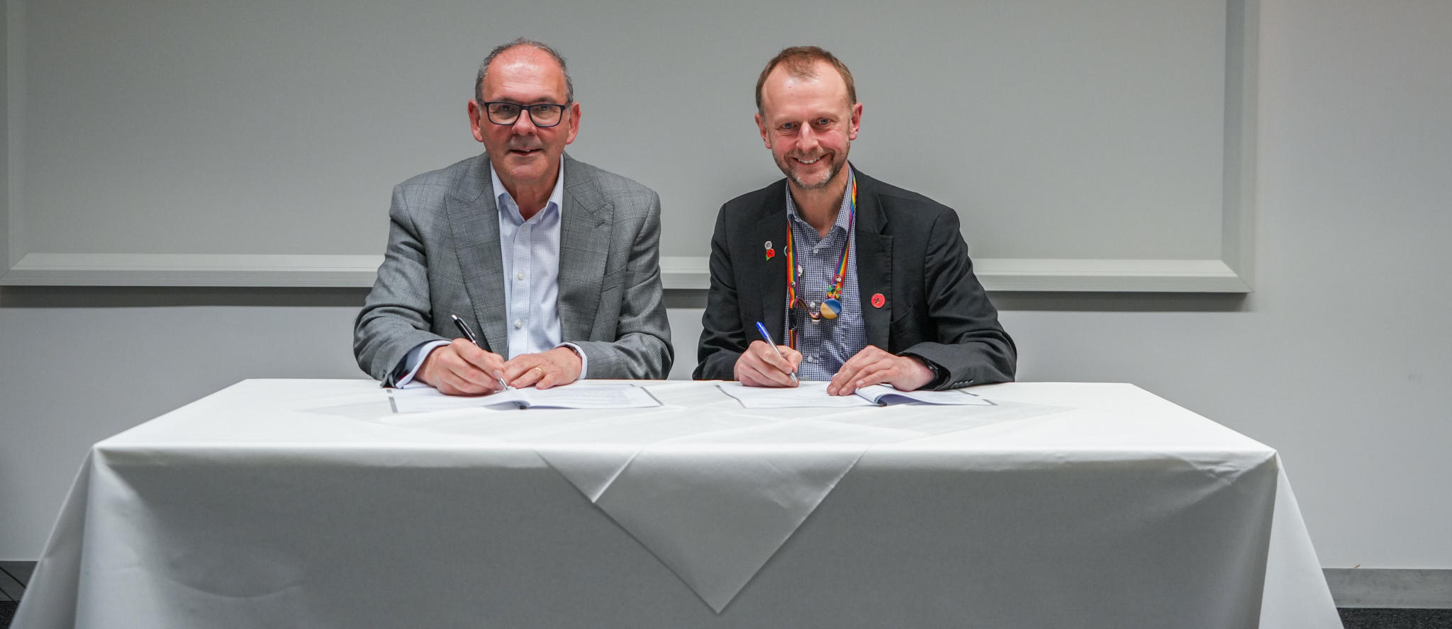 vice chancellors from hull and lincoln sign documents together