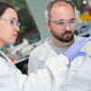 Biomedical science students examining a petri dish