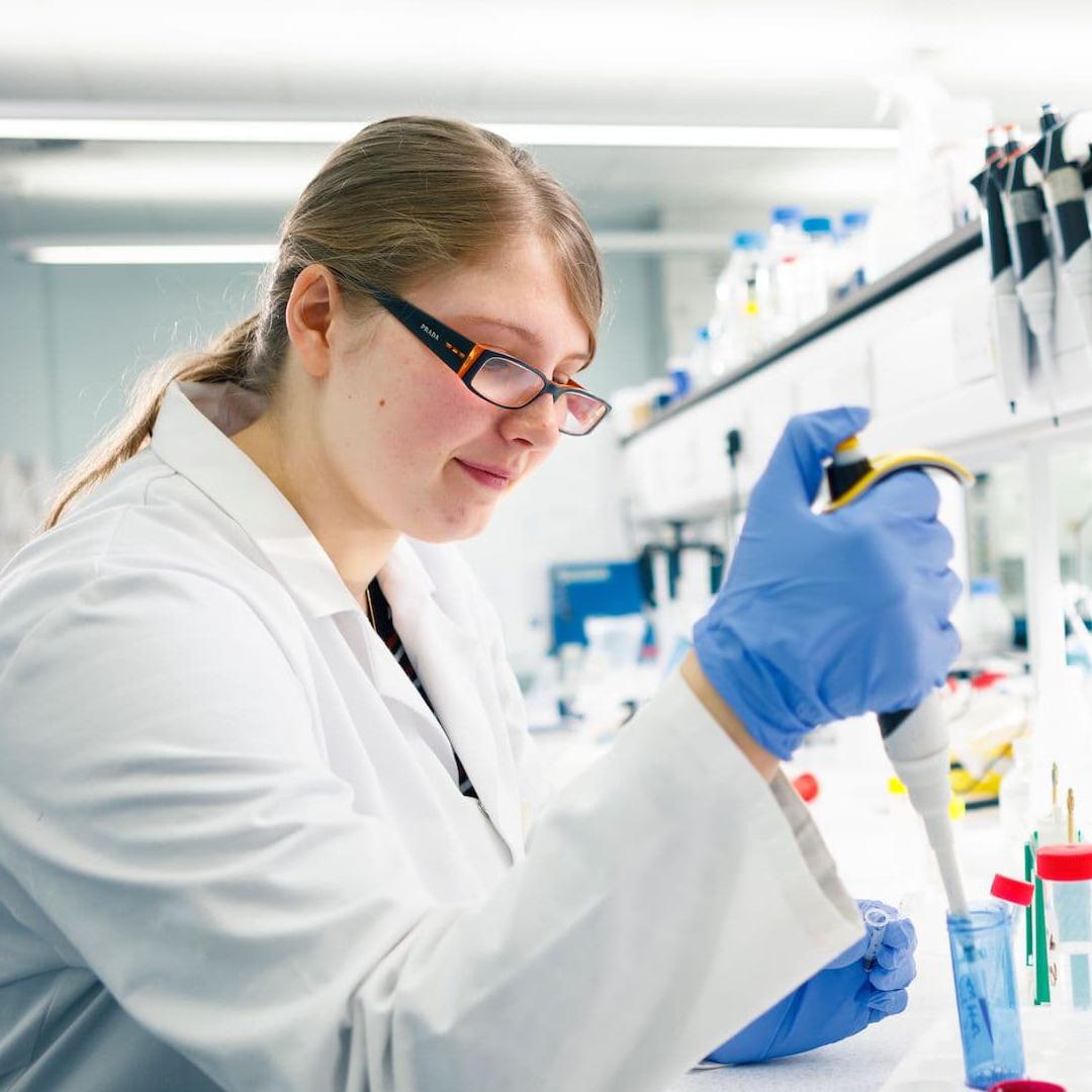 A Biomedical Sciences student working with equipment in the laboratory