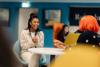 Student Aaliah Bhamji sat in the Bloomberg Suite