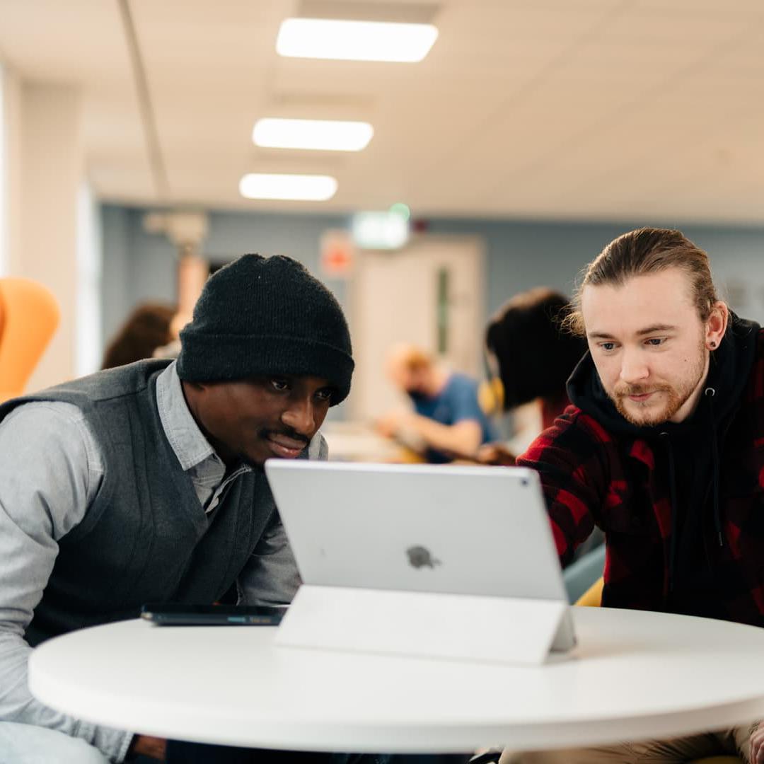 students collaborating in the Business Lounge
