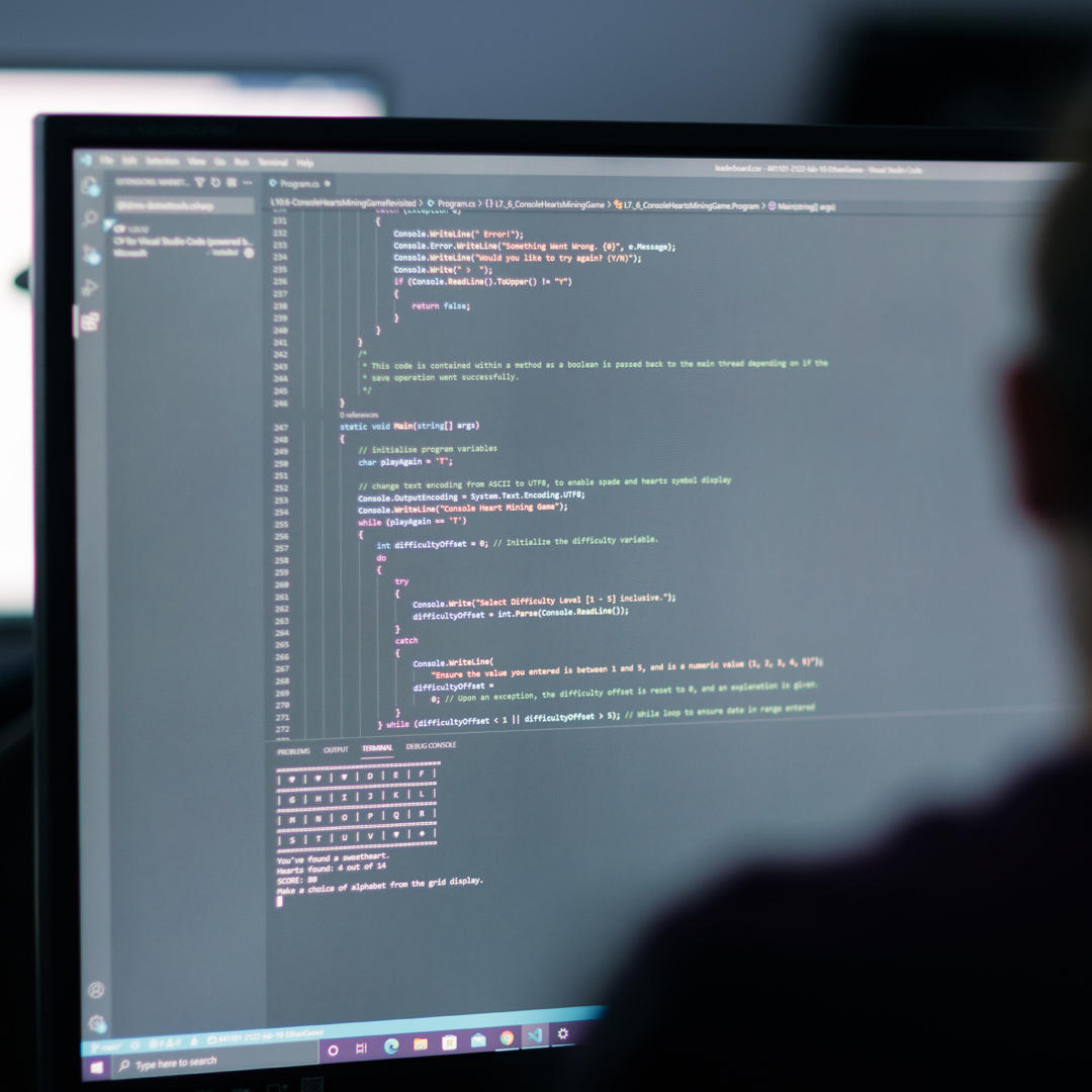 A computer monitor showing coding software