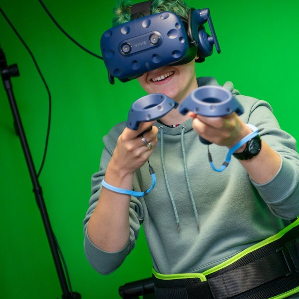 Digital Design student in VR studio wearing headset
