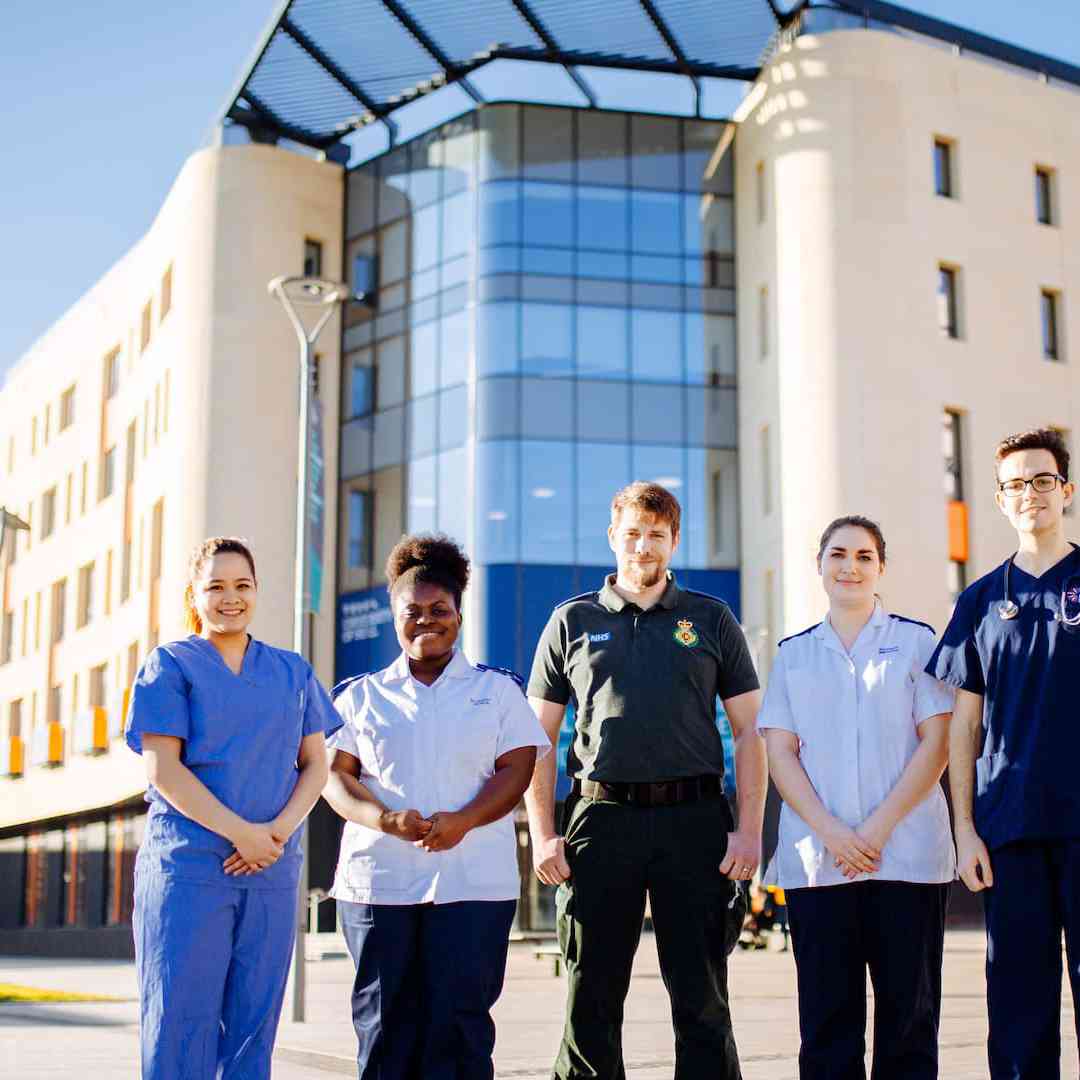 Health, Nursing and Midwifery students outside the Allam Medical Building