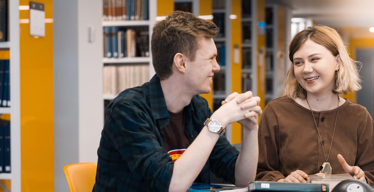 Two students working in the Brynmor Jones Library