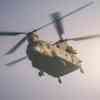 A chinook helicopter flying.