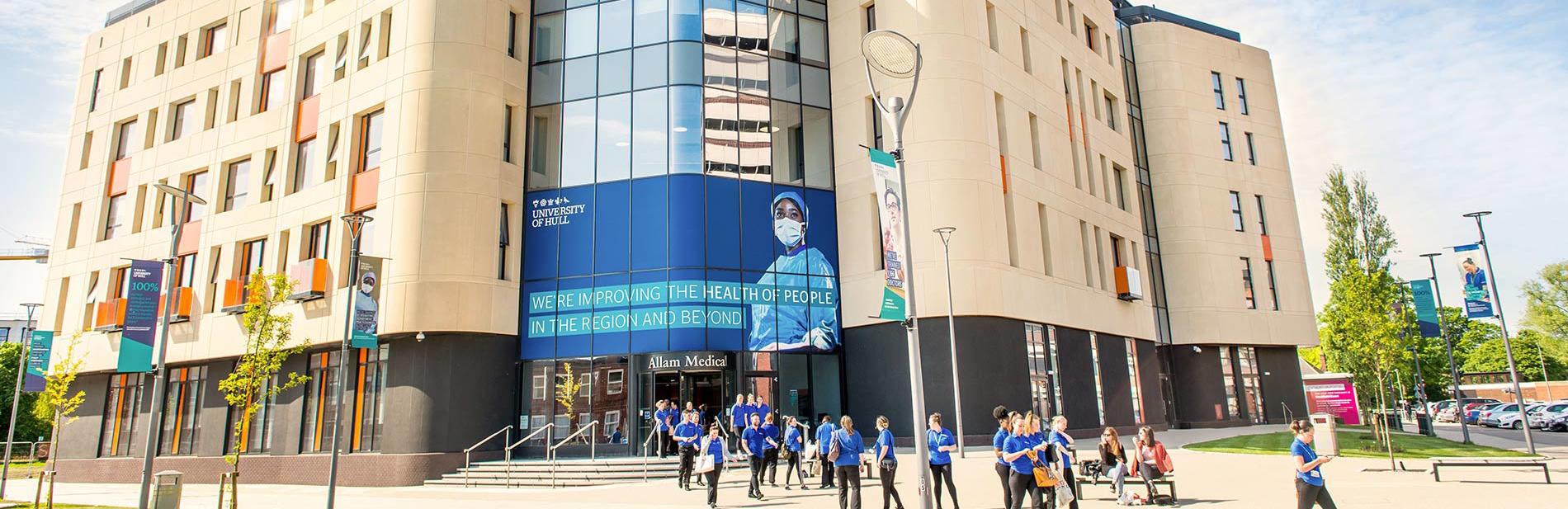 Allam-Medical-Building-with-Nursing-Students-outside