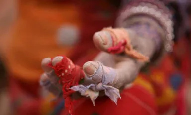 A hand covered in bandages - modern slavery