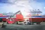 container being loaded onto a lorry