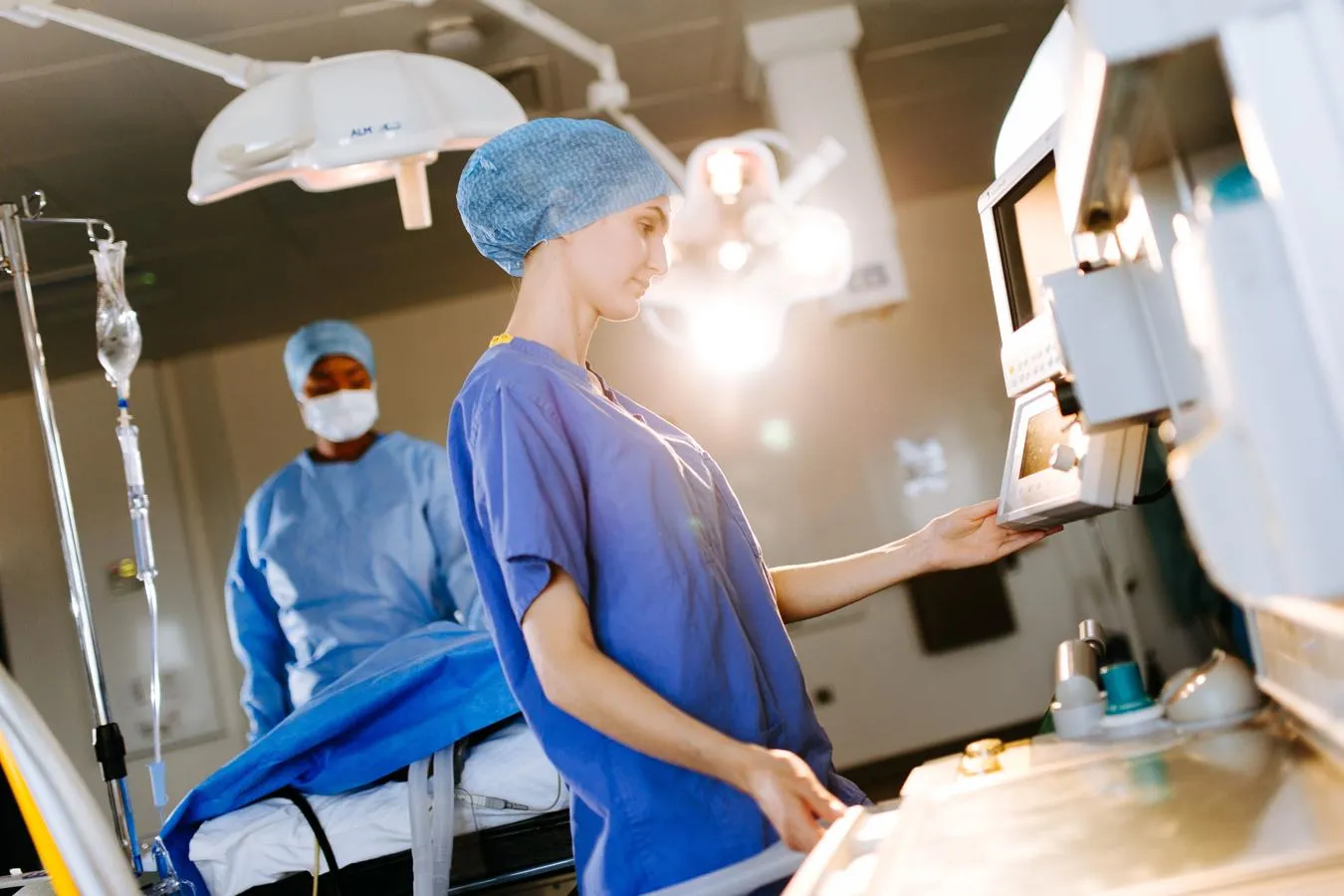 Anna Williams and Lizzie Olayemi using medical equipment ahead of a mock operation