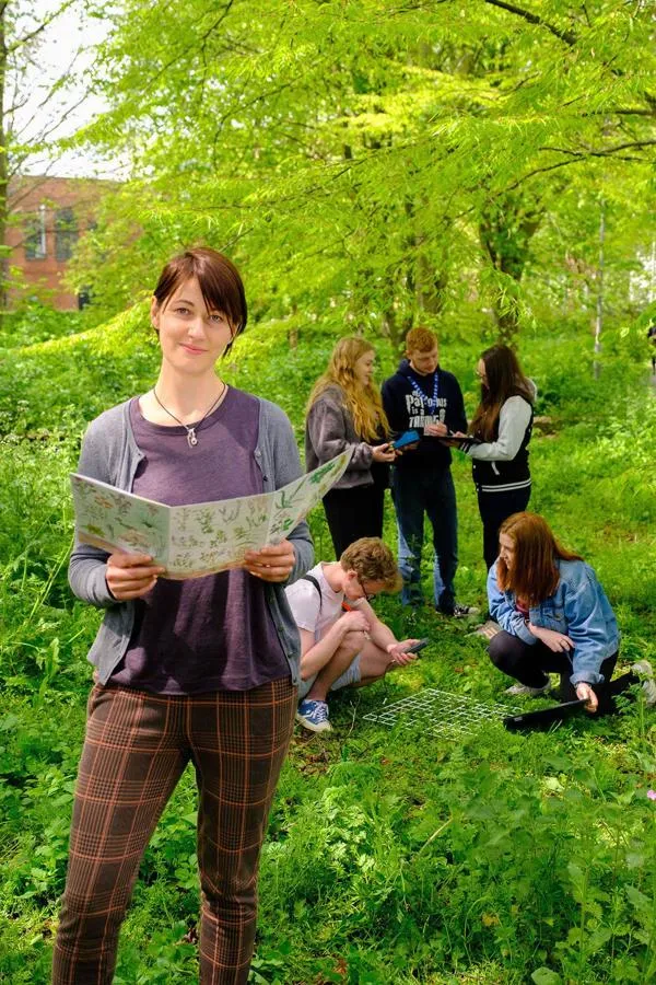 Students pictured in nature conducting research