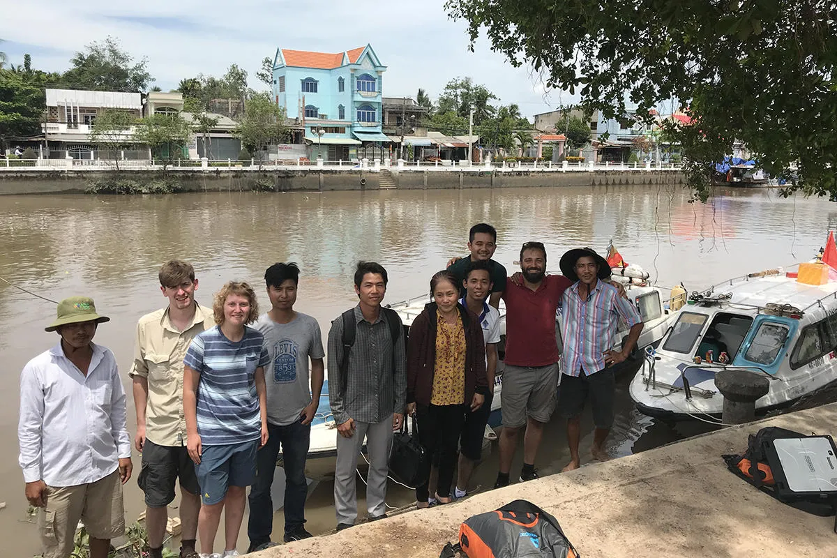 Rameses research team members on the river bank