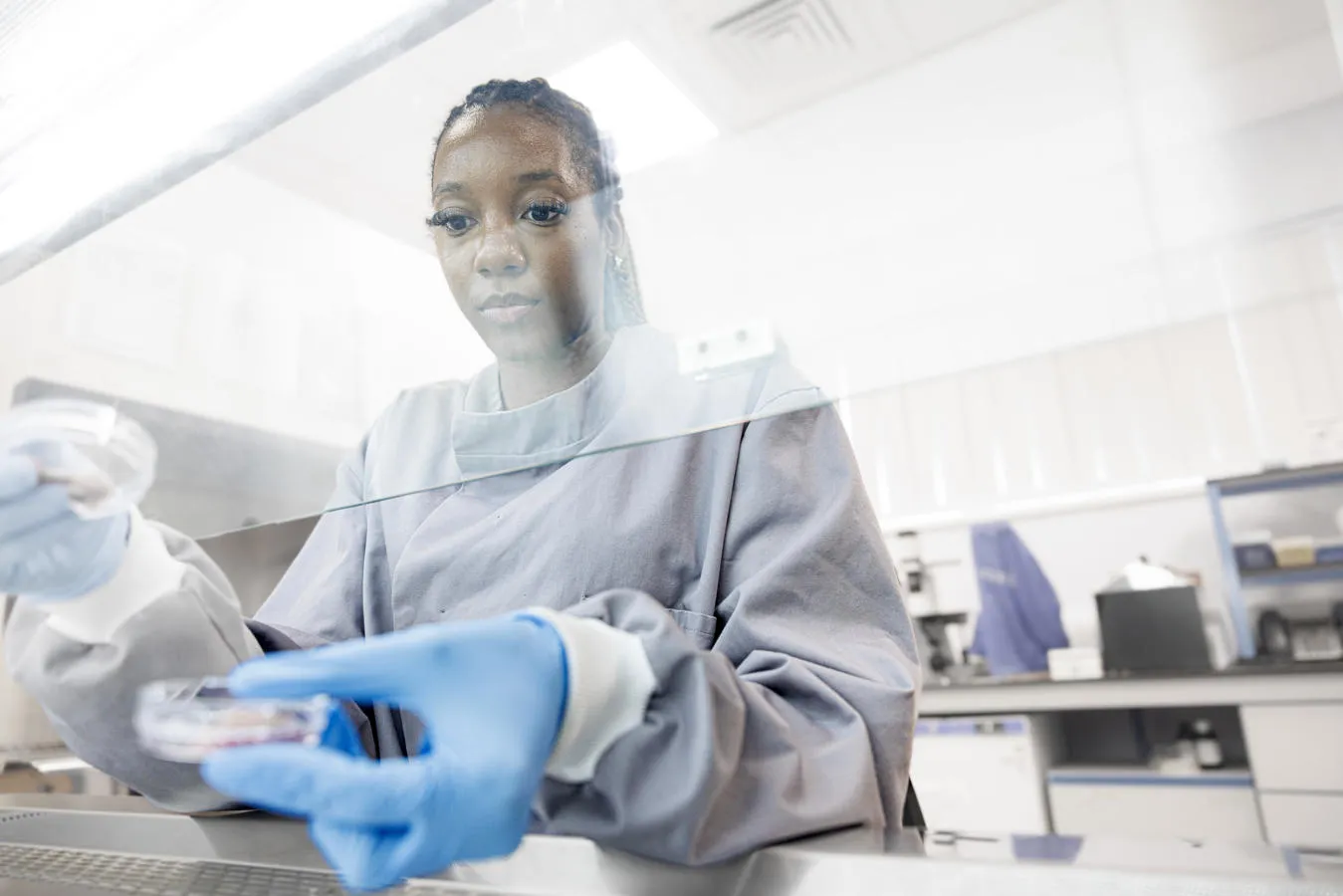 Female laboratory worker, working in a laboratory