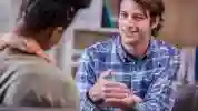 A student talks to a school counsellor