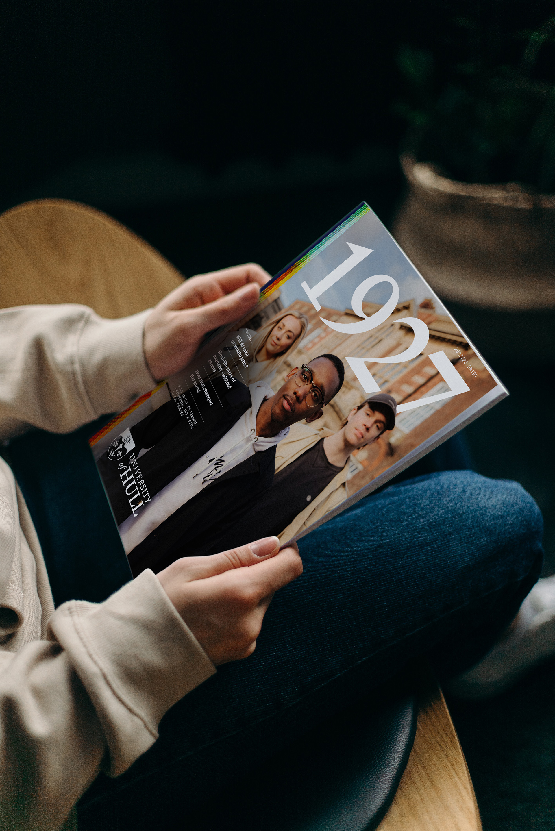A student holds a copy of 1927 magazine