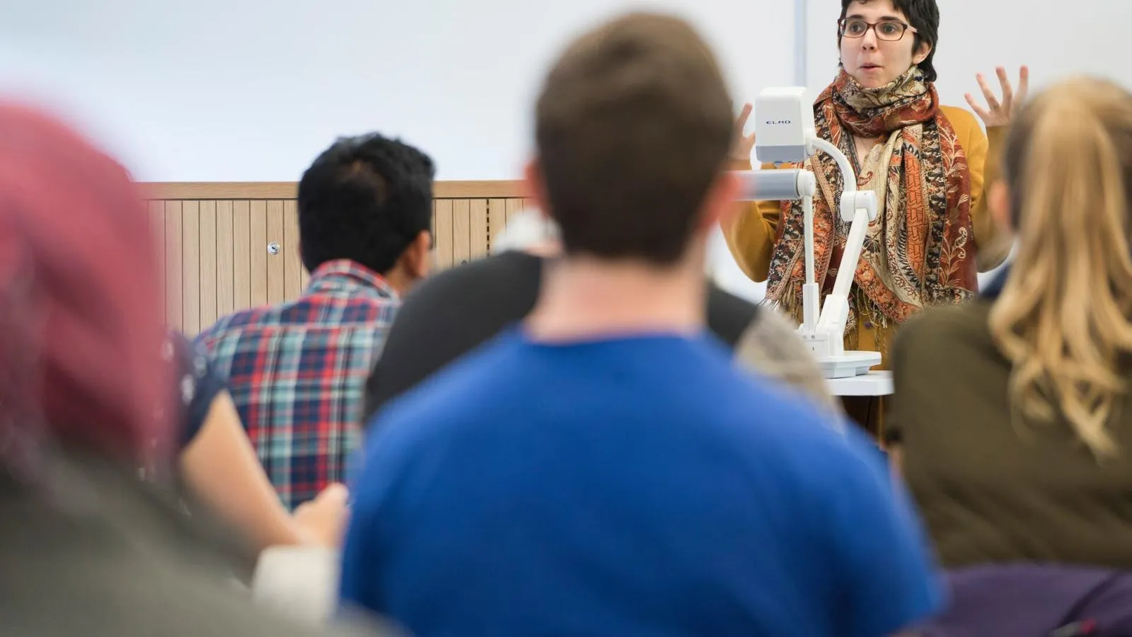 A student teacher speaking to a class of students