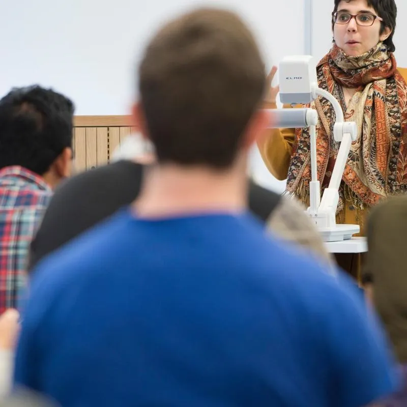 A student teacher speaking to a class of students