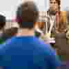 A student teacher speaking to a class of students