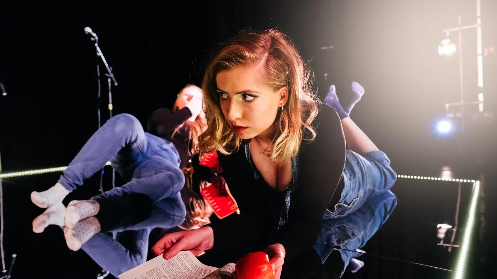 A woman stood on stage