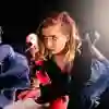 A woman stood on stage