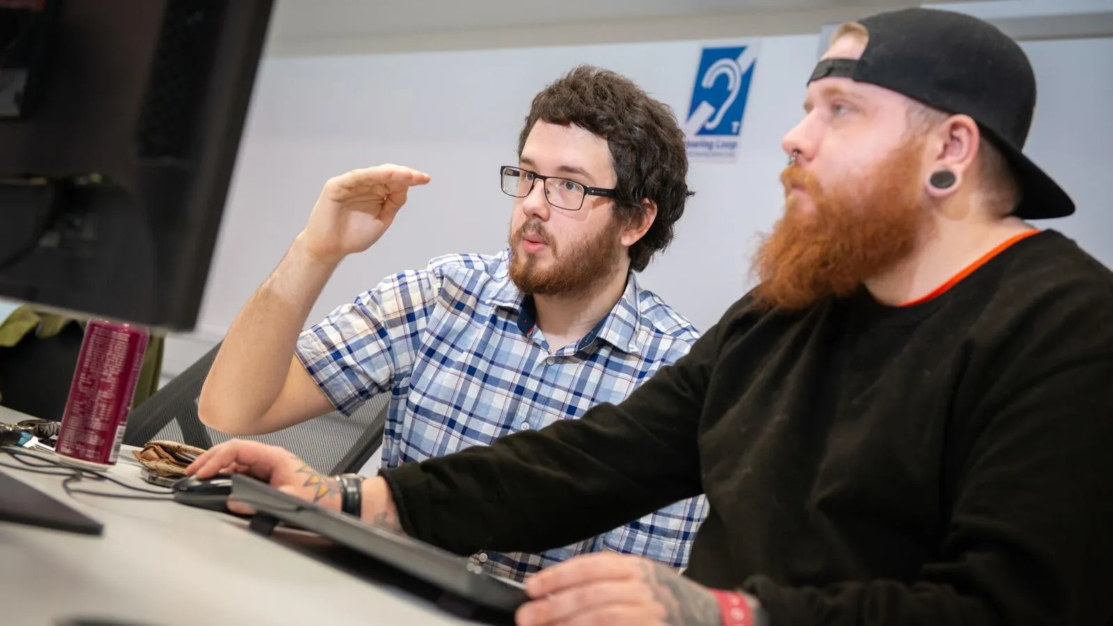 Students working on a computer in the Digital Design PC Lab
