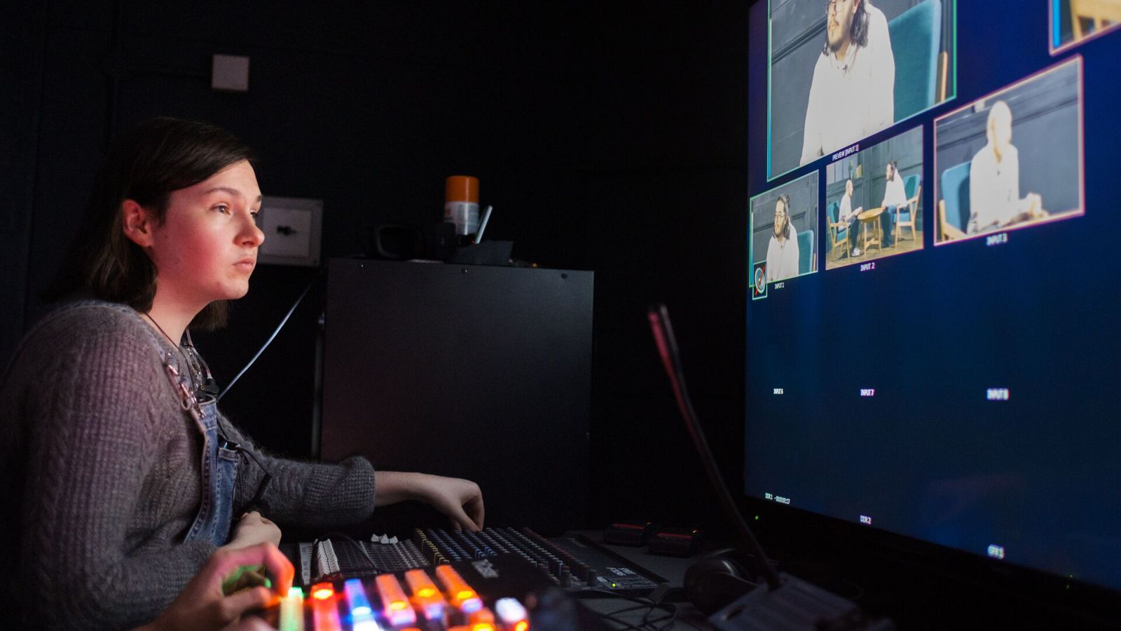 A student editing a film on a computer screen