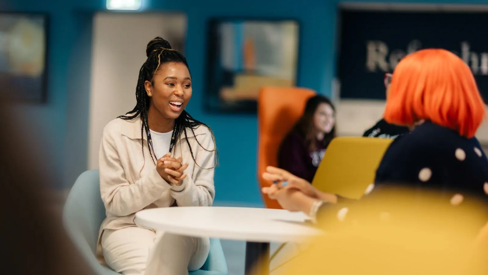 Two students sat in the business lounge