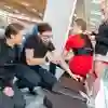 A group of students gathered around a bench