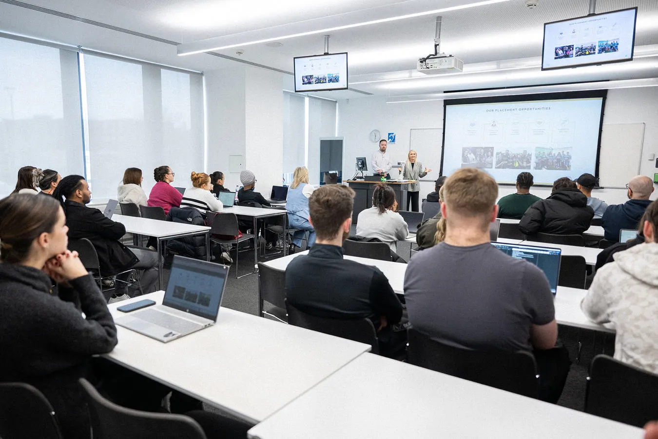 A class full of prospective students receiving a subject talk at an open day