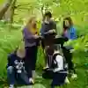 University of Hull Environmental Science student doing fieldwork in a wooded area