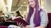 A student reading in the library