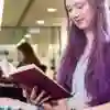 A student reading in the library