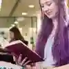A student reading in the library