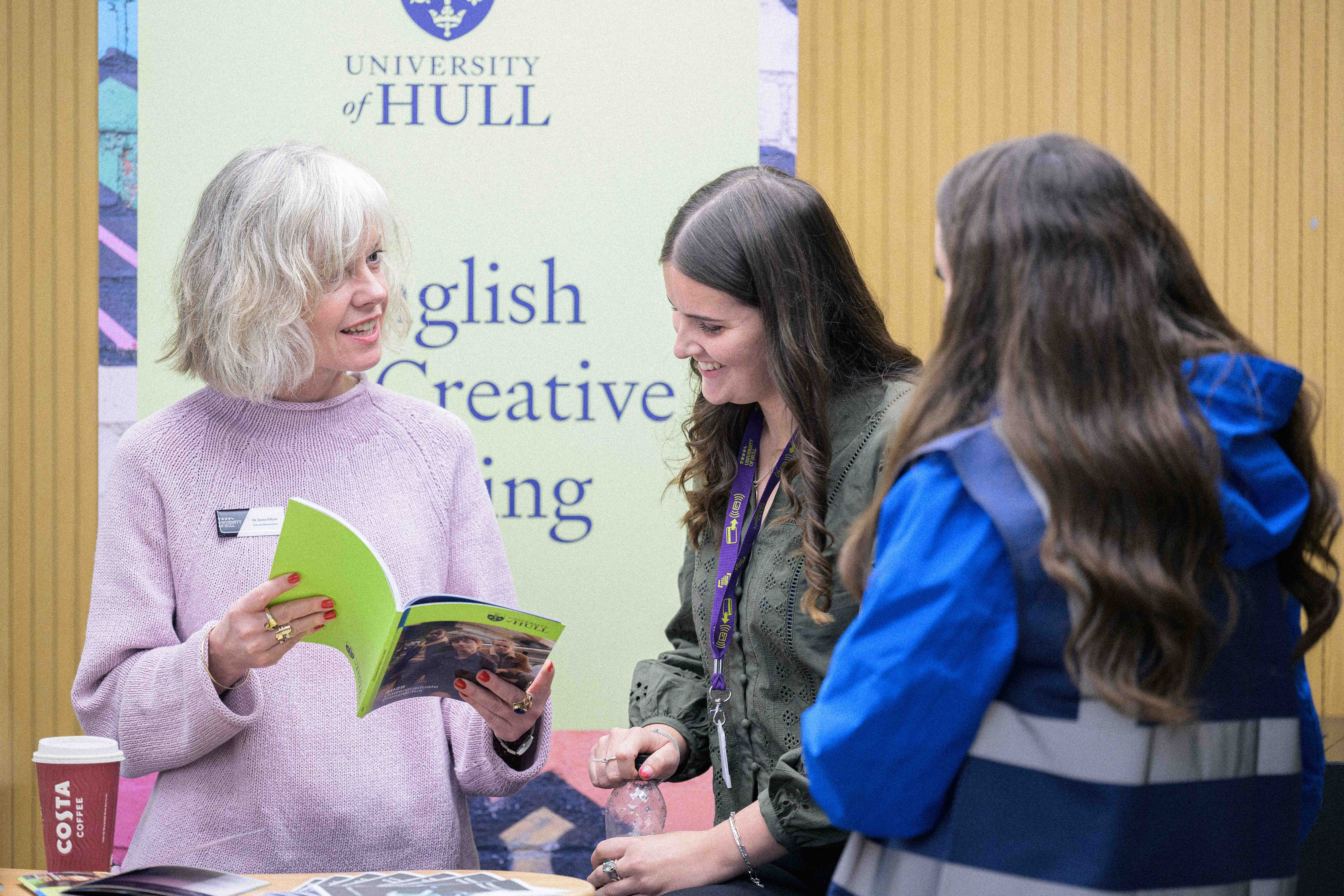 A student gaining information at a subject stand