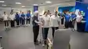 A group of students watching a physiotherapy practical
