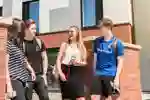 Students Chatting Outside The Courtyard