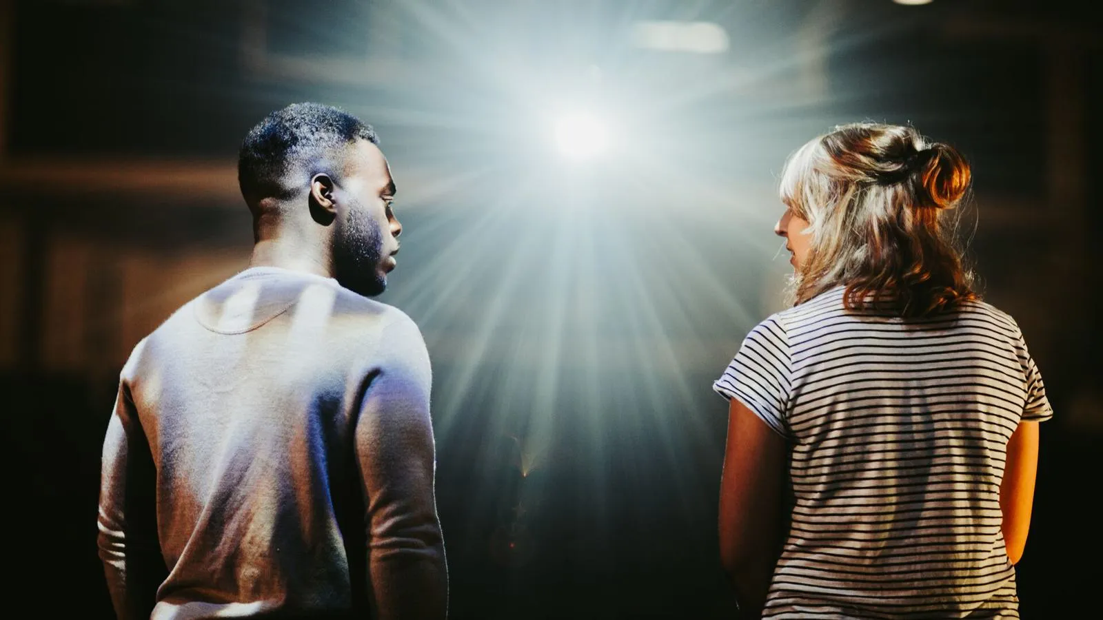 Two students stood on stage