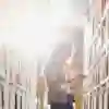 Student stood reading in library