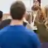 A student teacher speaking to a class of students