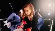 A woman stood on stage