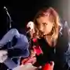 A woman stood on stage