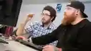 Design students using a computer in a PC lab