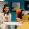 Two students sat in the business lounge