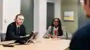Two students sat at desk