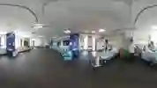 A mock hospital ward with students practising on pretend patients