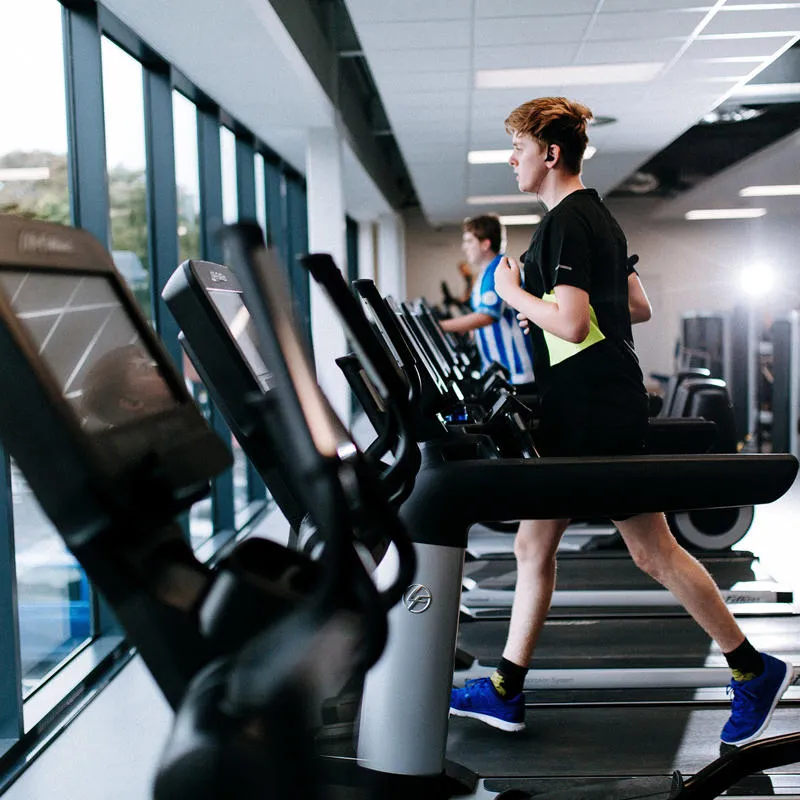 Man running on a treadmill in the Allam Sport Centre