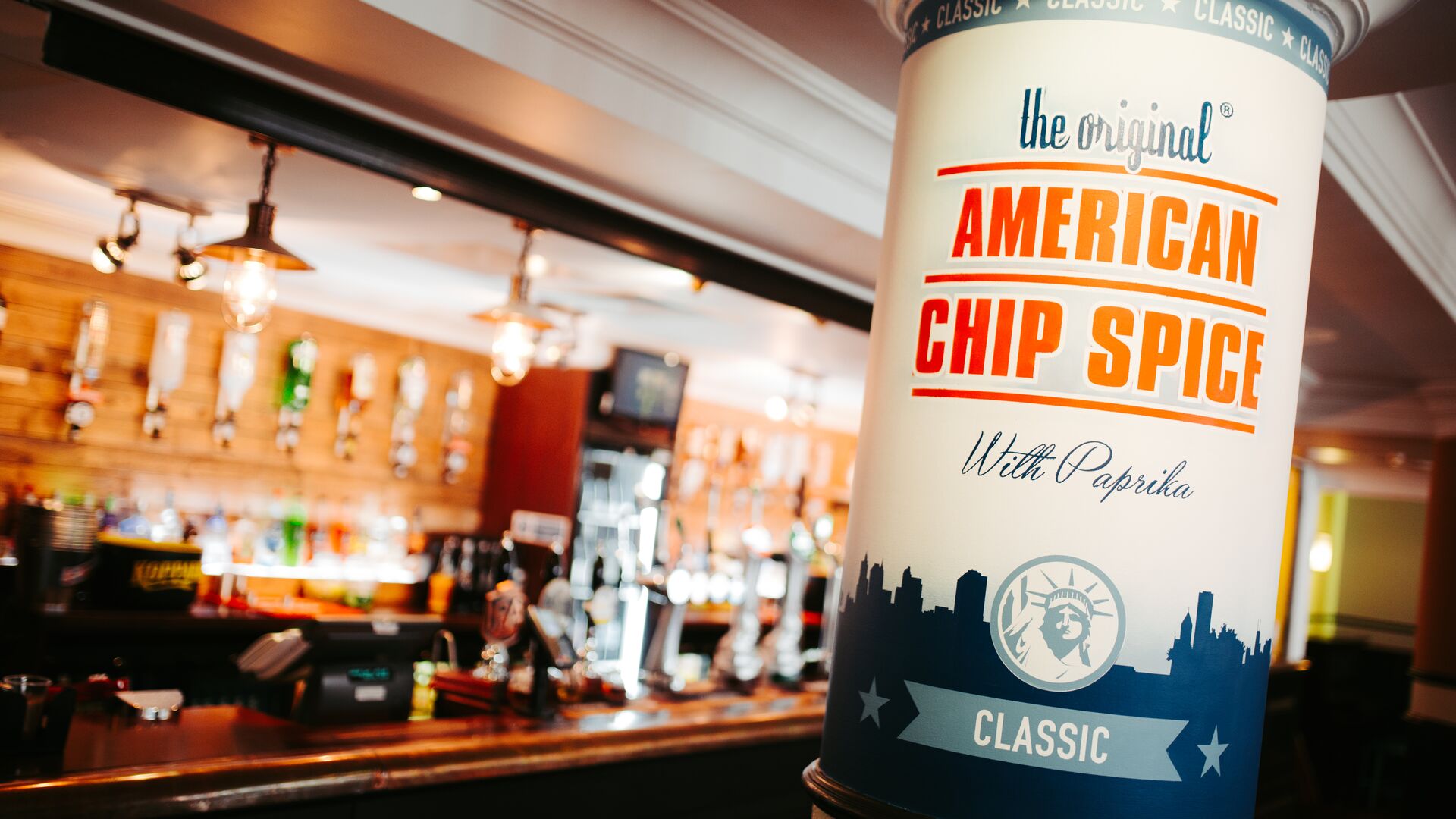 American chip spice packaging wrapped around a pillar in University of Hull weatherspoons