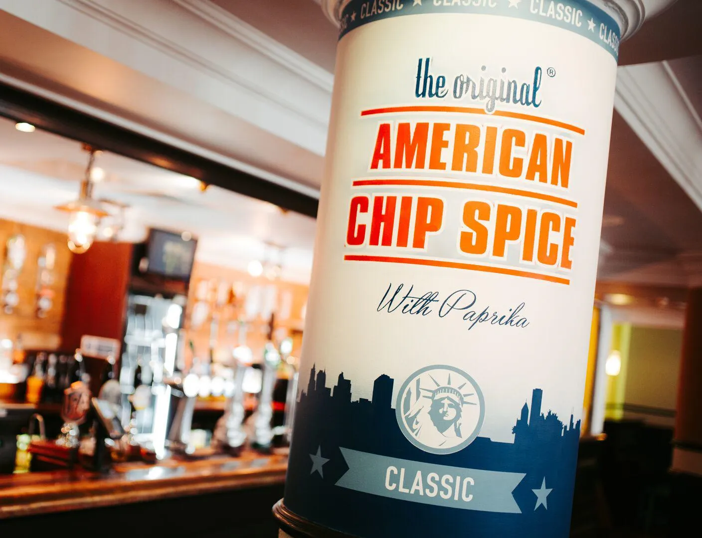 American chip spice packaging wrapped around a pillar in University of Hull weatherspoons