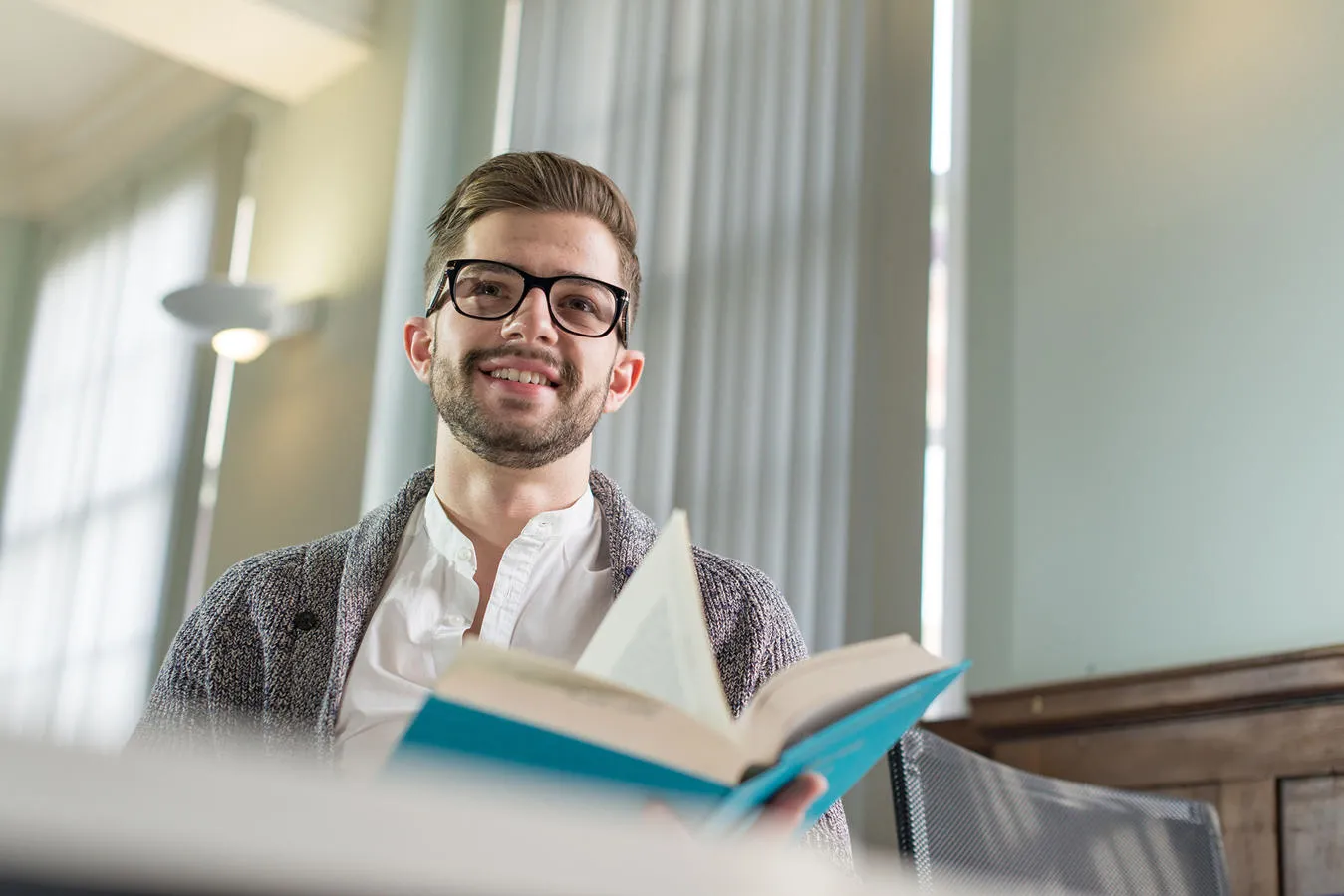 Law student reading a book